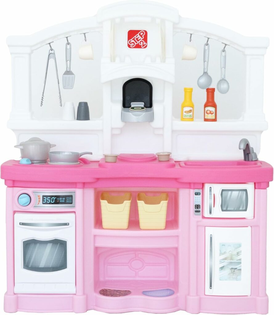 Step2 Fun with Friends compact play kitchen with lights, sounds, sink, oven, and 25-piece accessory set